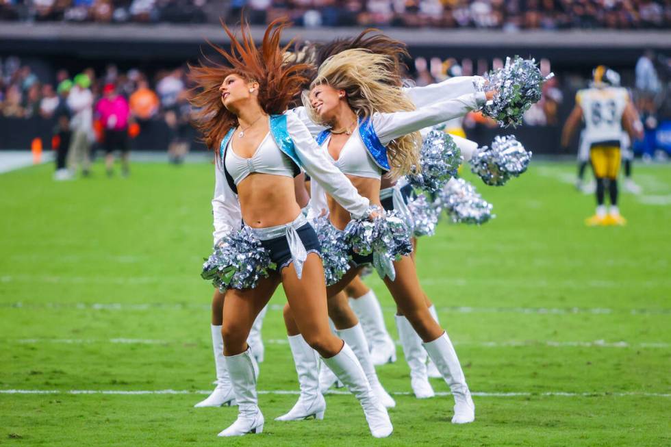 The Raiderettes perform during the second half of an NFL football game between the Raiders and ...