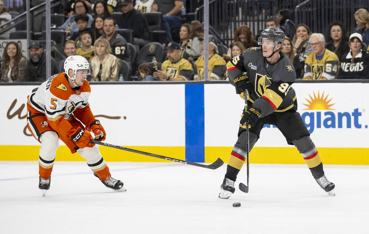 Golden Knights right wing Victor Olofsson (95) keeps the puck from Anaheim Ducks defenseman Urh ...