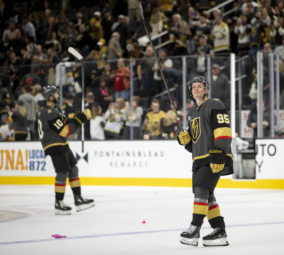 Golden Knights right wing Victor Olofsson (95) salutes the crowd after the NHL hockey game, def ...