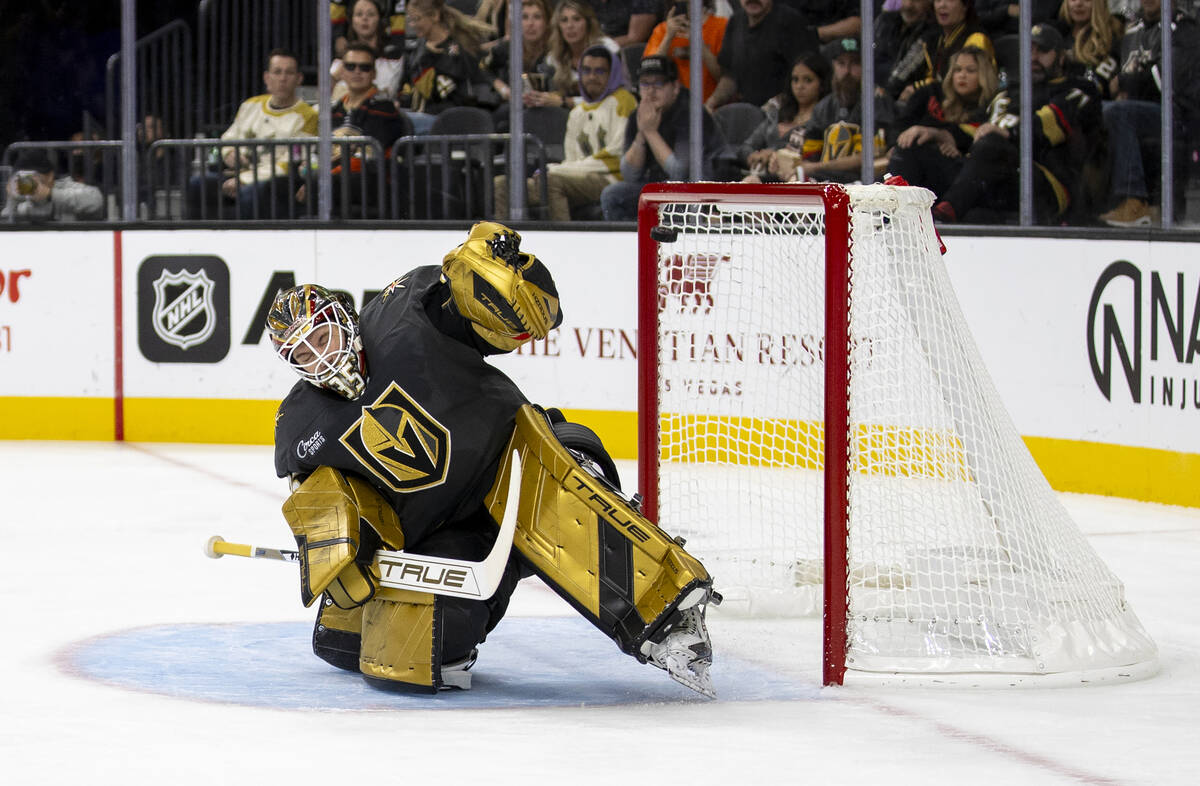 Golden Knights goaltender Ilya Samsonov (35) deflects a shot during the NHL hockey game against ...