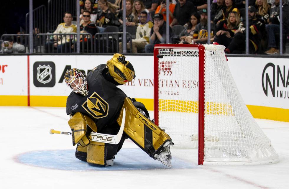 Golden Knights goaltender Ilya Samsonov (35) deflects a shot during the NHL hockey game against ...