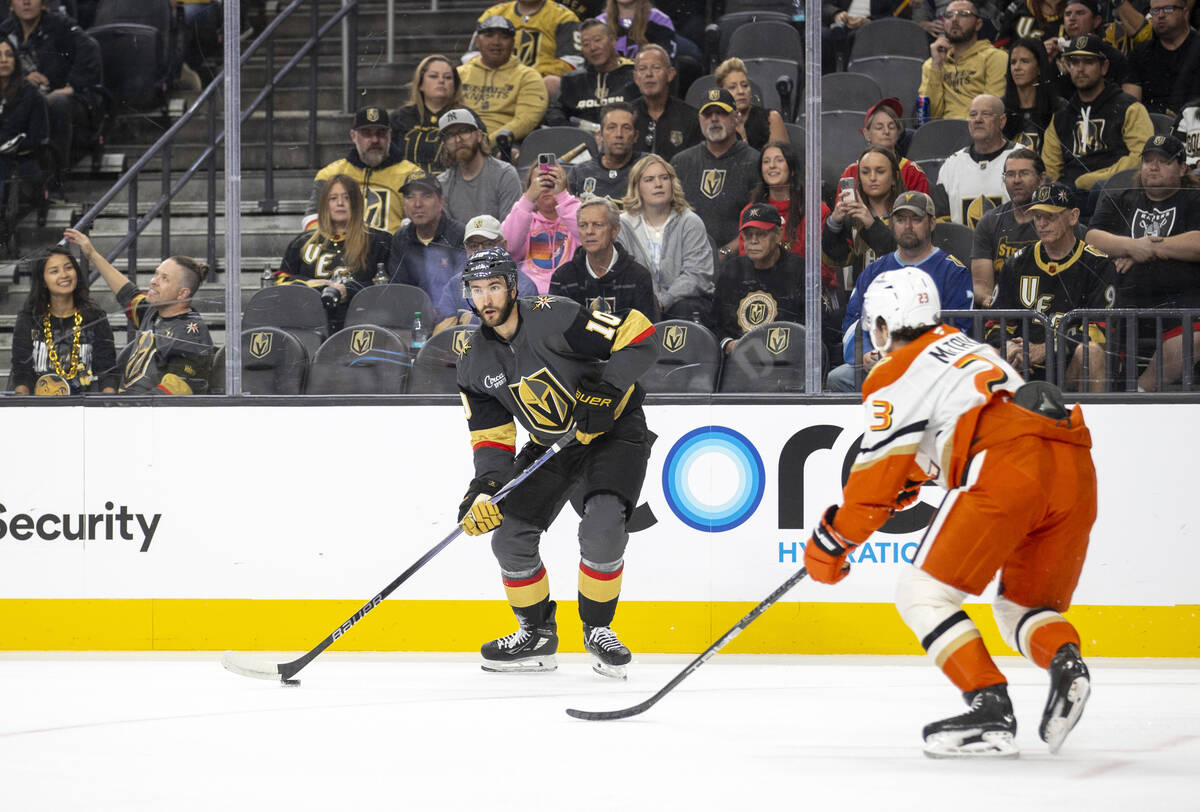 Golden Knights center Nicolas Roy (10) controls the puck during the NHL hockey game against the ...