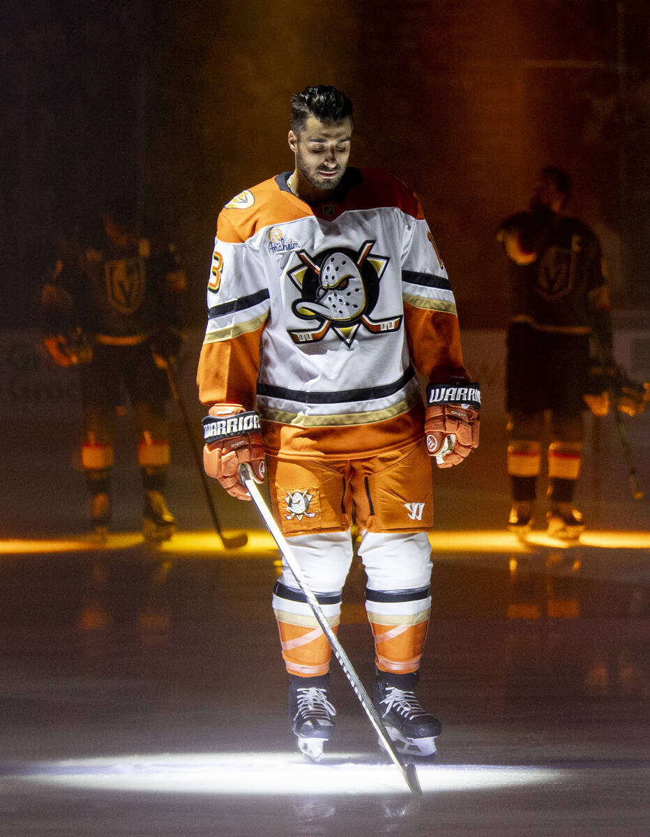 Anaheim Ducks center Robby Fabbri (13) stands for the national anthem before the NHL hockey gam ...