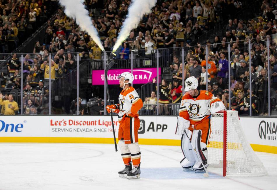 Anaheim Ducks defenseman Cam Fowler (4) and Anaheim Ducks goaltender James Reimer (47) stand in ...