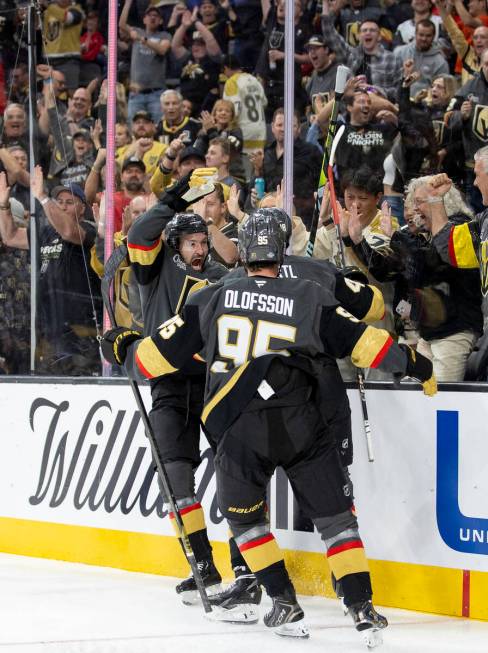 The Golden Knights celebrate a goal during the third period of the NHL hockey game against the ...