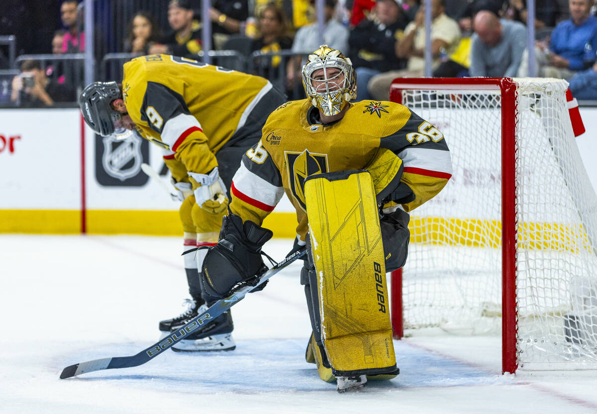 Golden Knights goaltender Logan Thompson (36) and center Jack Eichel (9) are dejected as anothe ...