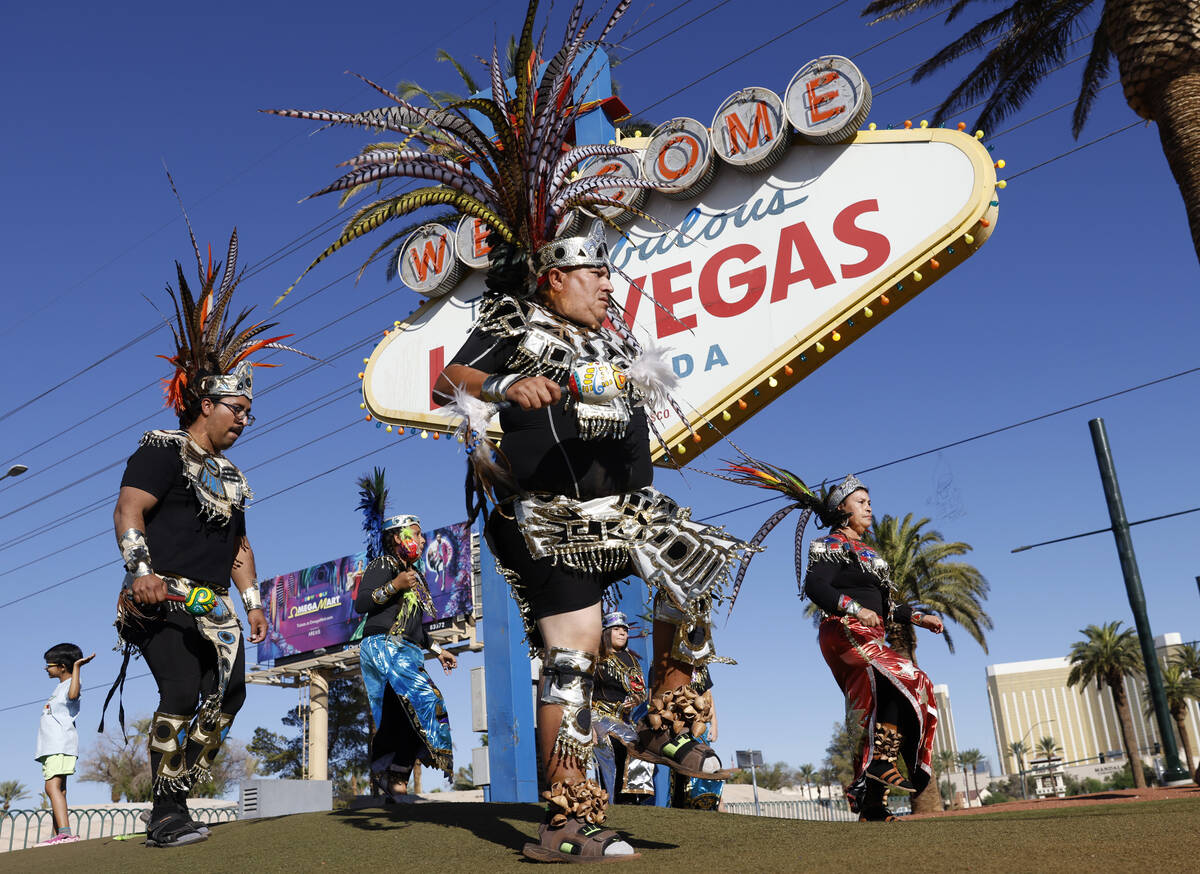 Members of the Danza Tonantzi Guadalupana Las Vegas dance group perform during Indigenous Peopl ...