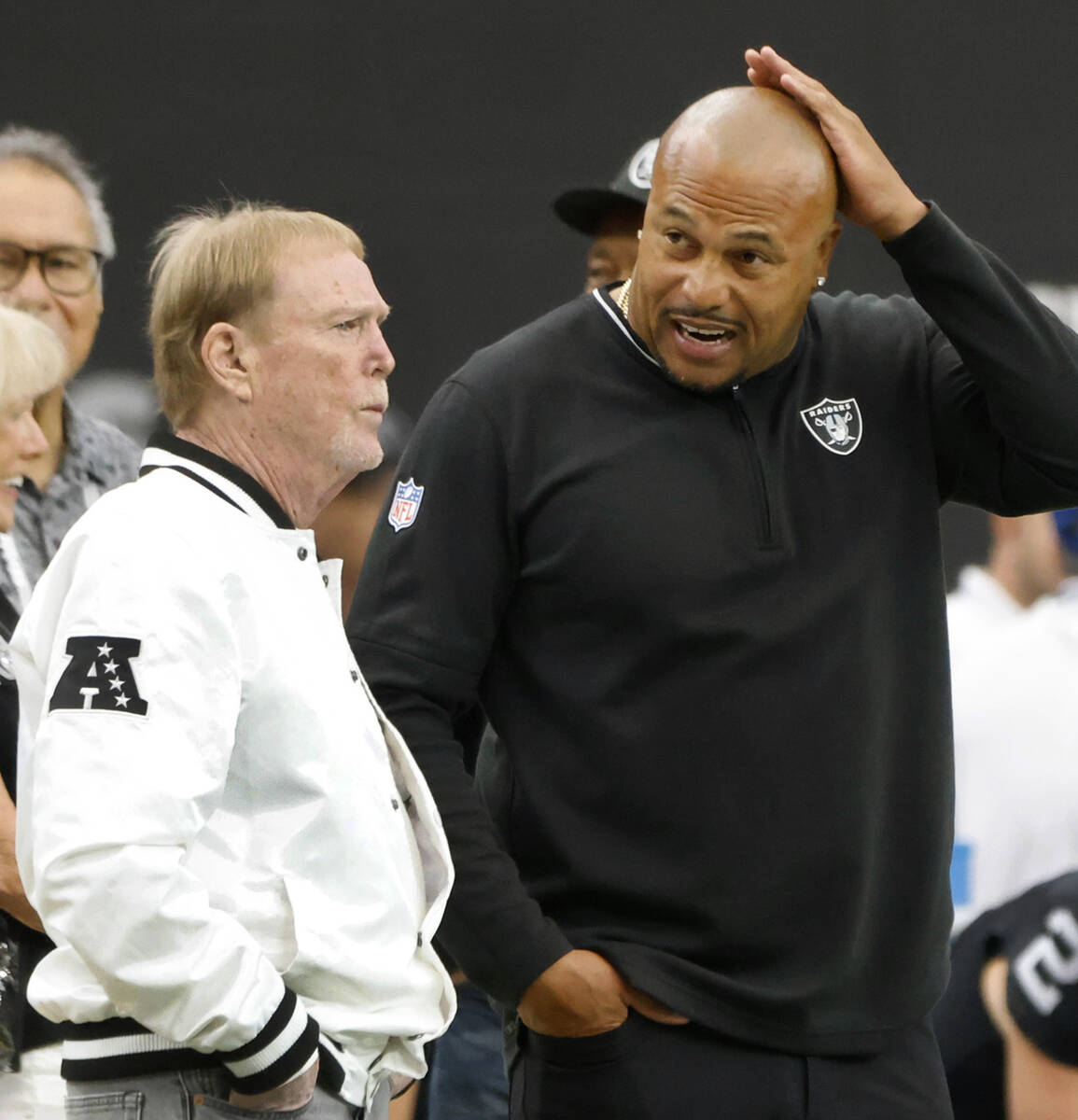 Raiders owner Mark Davis and head coach Antonio Pierce chat before an NFL game against Pittsbur ...