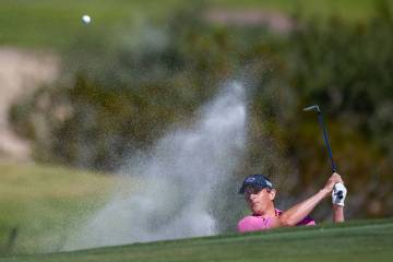 Henrik Norlander wedges out of the sand onto the green at hole 3 during day 3 play at the Shrin ...