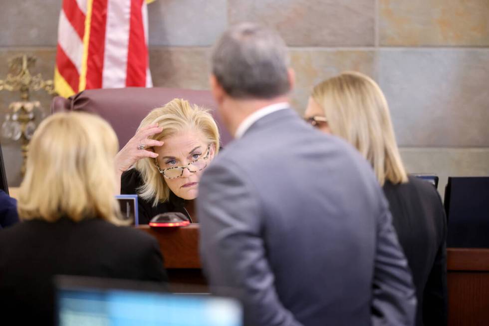 District Judge Michelle Leavitt listens to attorneys during opening statement during the murder ...