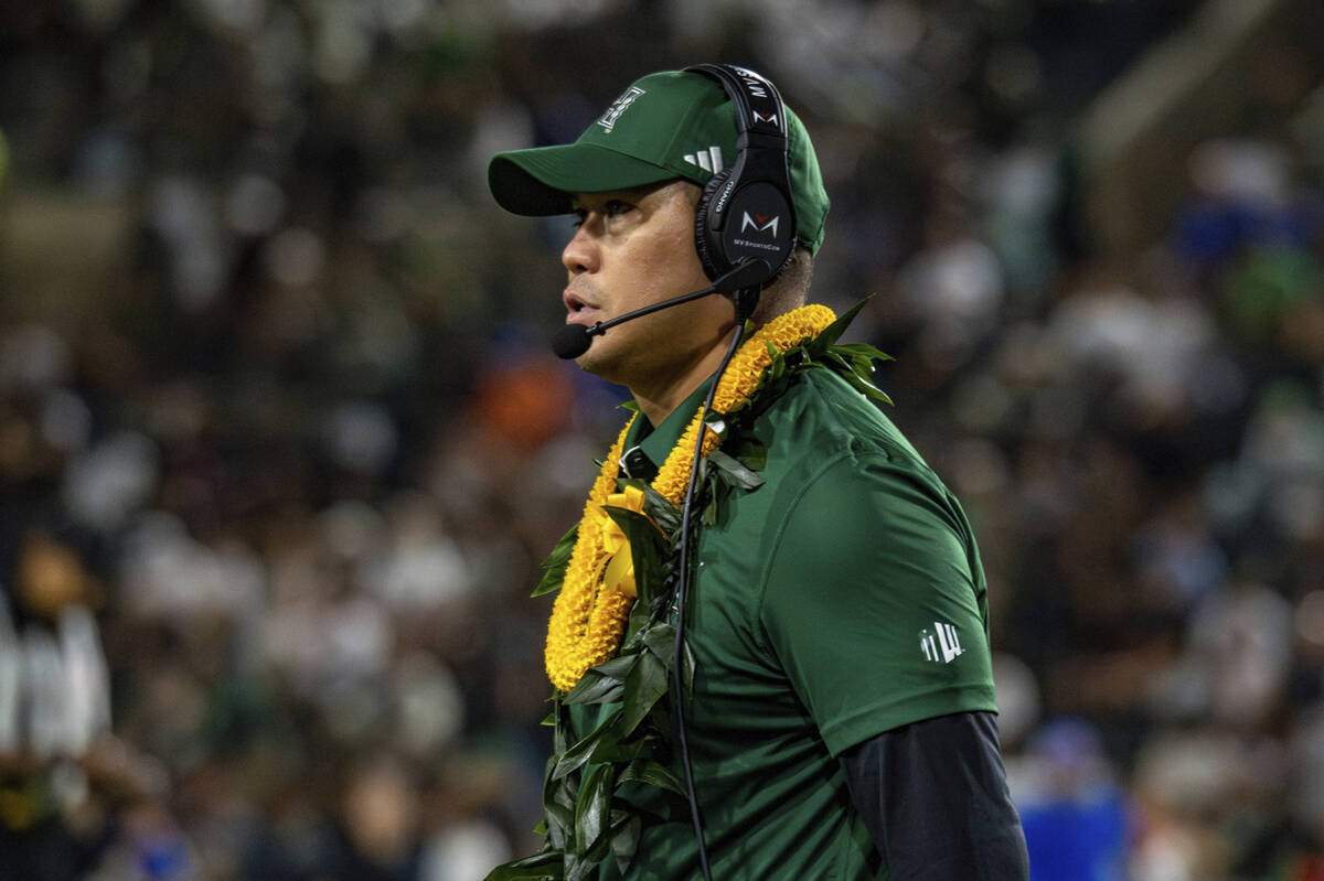 Hawaii head coach Timmy Chang watches during the first half of an NCAA college football game ag ...