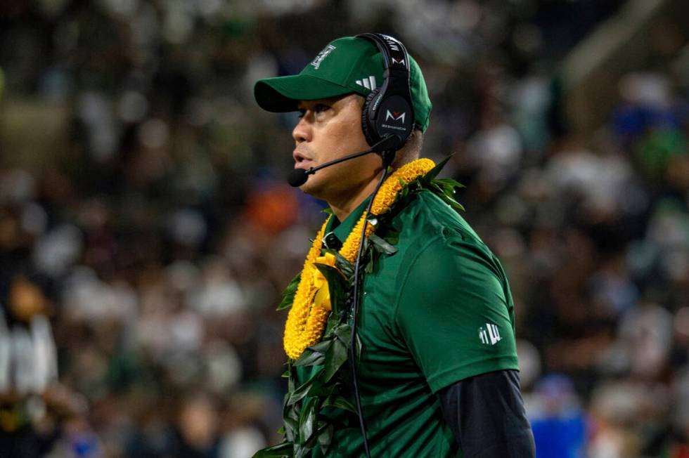 Hawaii head coach Timmy Chang watches during the first half of an NCAA college football game ag ...