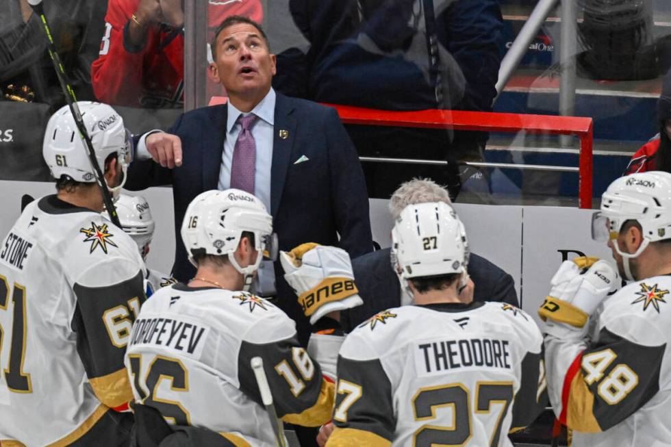 Vegas Golden Knights head coach Bruce Cassidy talks with his team during the third period of an ...