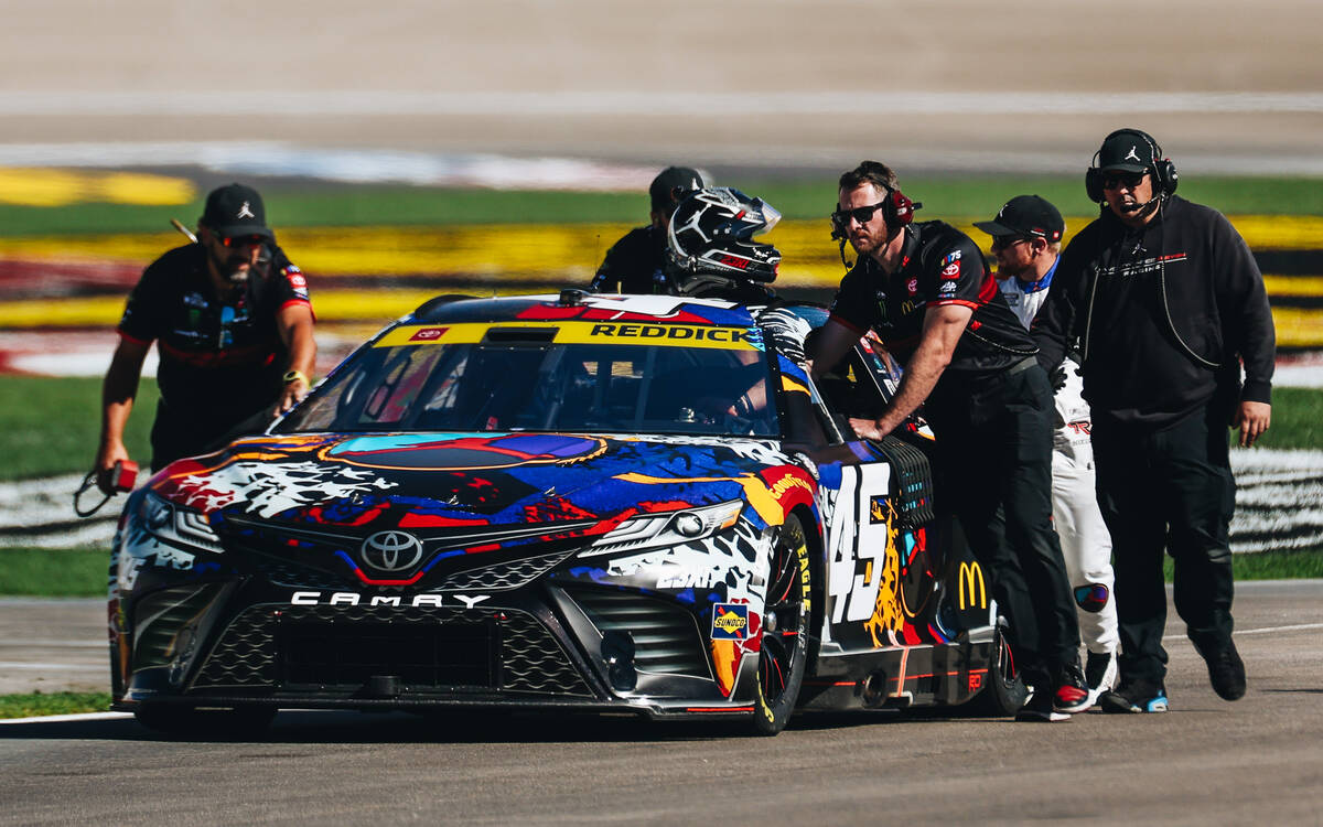 Tyler Reddick gets ready to ride his race car during practice for the NASCAR South point 400 at ...