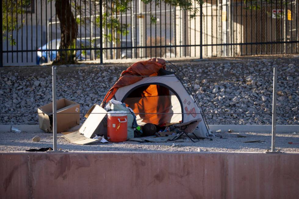 Tents sit along the Flamingo Wash near Desert Inn and Sandhill Roads Tuesday, Oct. 15, 2024, in ...