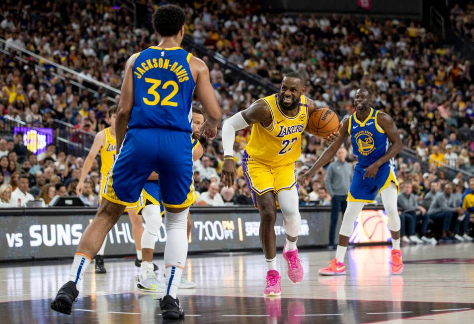 Los Angeles Lakers forward LeBron James (23) rushes toward the paint during the NBA preseason b ...