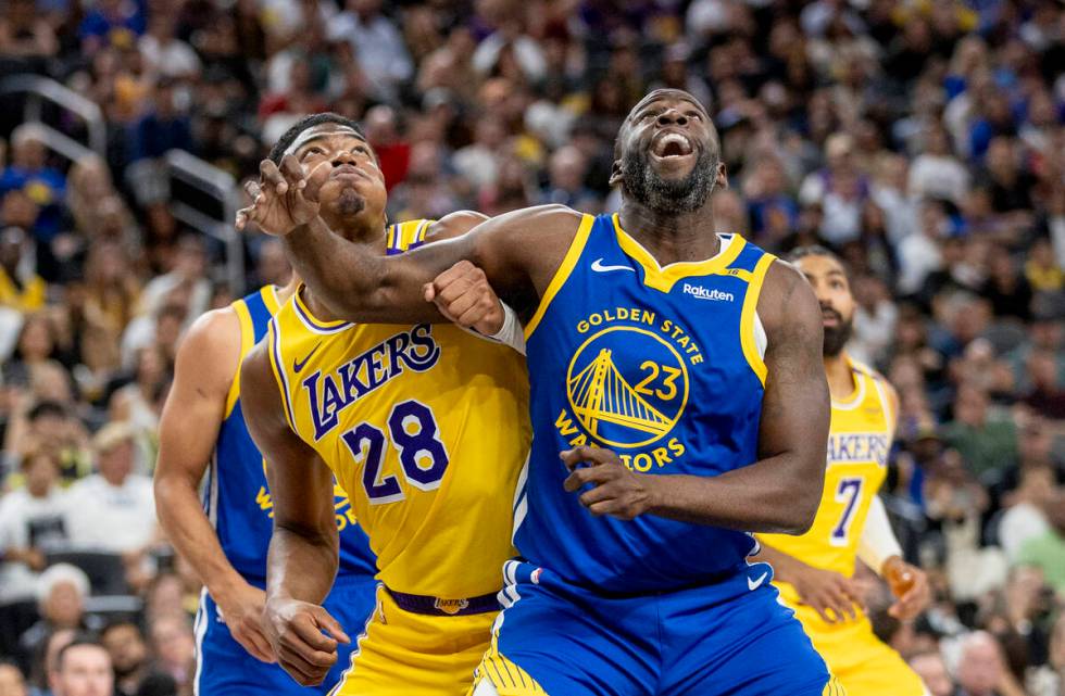 Los Angeles Lakers forward Rui Hachimura (28) and Golden State Warriors forward Draymond Green ...