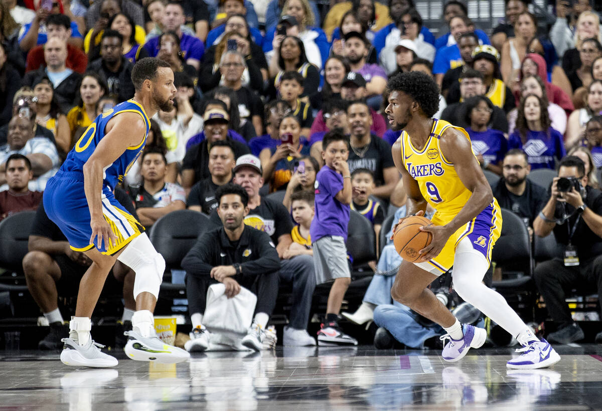 Los Angeles Lakers guard Bronny James Jr. (9) competes against Golden State Warriors guard Step ...