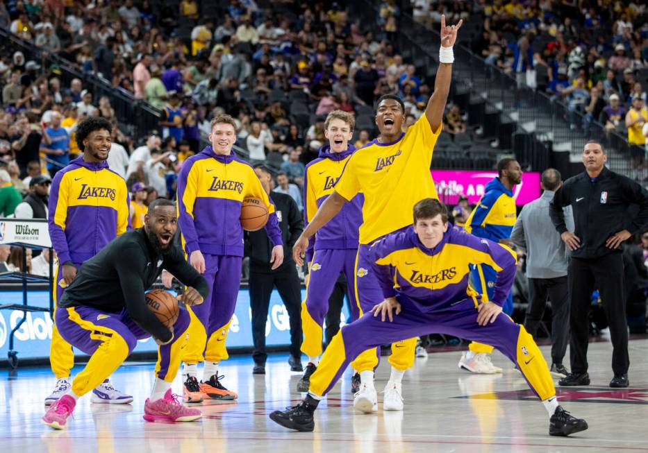 The Los Angeles Lakers react during warmups before the NBA preseason basketball game against th ...