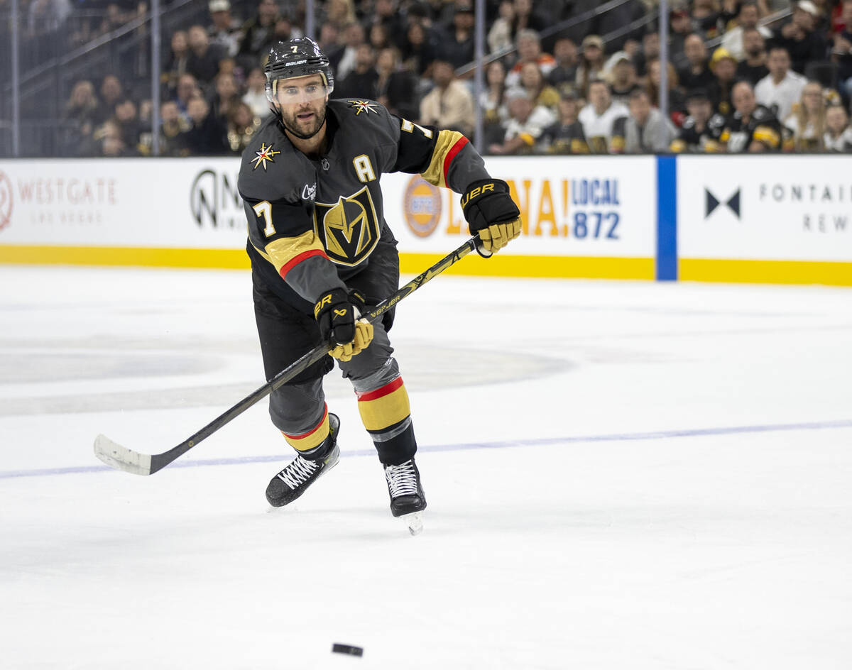 Golden Knights defenseman Alex Pietrangelo (7) passes the puck during the first period of the N ...