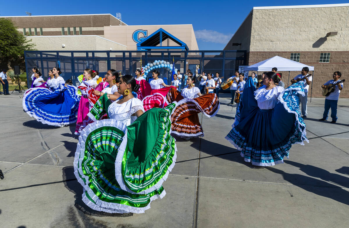 Student Folklorico dancers backed up by a mariachi band perform at the Silver State Education F ...