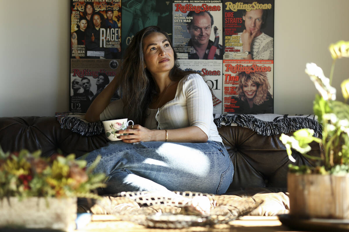 Headspace meditation teacher, Rosie Acosta, looks on in her living room Monday, Sept. 30, 2024, ...