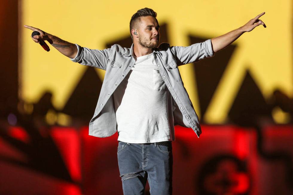 FILE - Liam Payne of One Direction performs during the Honda Civic Tour at Qualcomm Stadium on ...