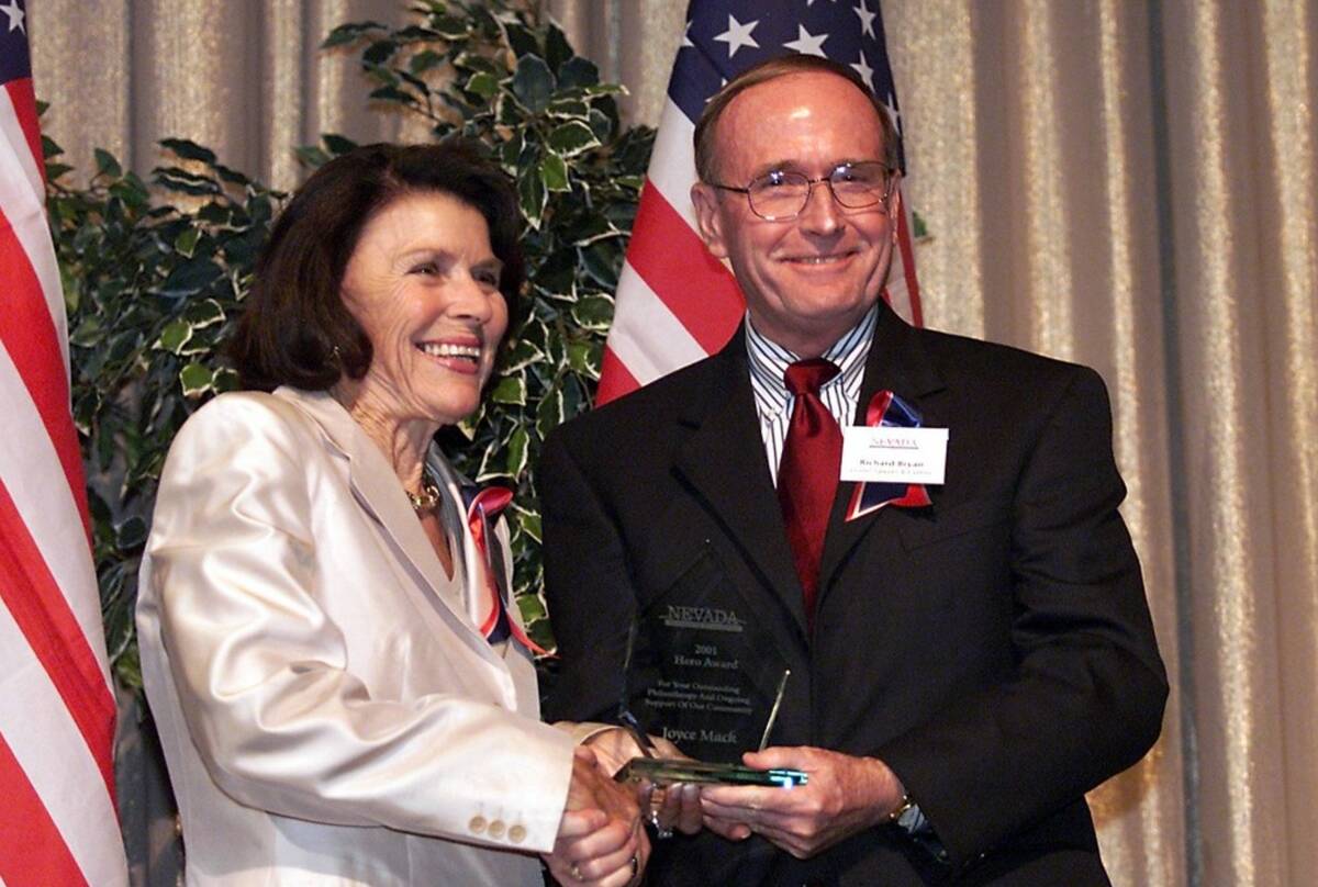 Joyce Mack meets with former Nevada Sen. Richard Bryan during the Nevada Community Foundation's ...