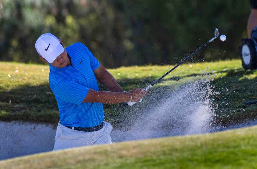 Tom Kim chips out of the sand at hole #7 during the opening round of the Shriners Children's Op ...