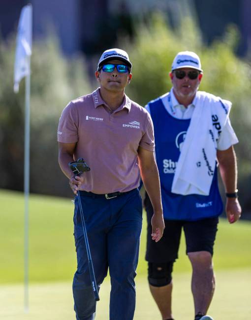 Kurt Kitayama walks away unhappy with his caddie at hole #7 during the opening round of the Shr ...