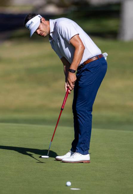 Beau Hossler eyes a putt about the sink at hole #7 during the opening round of the Shriners Chi ...