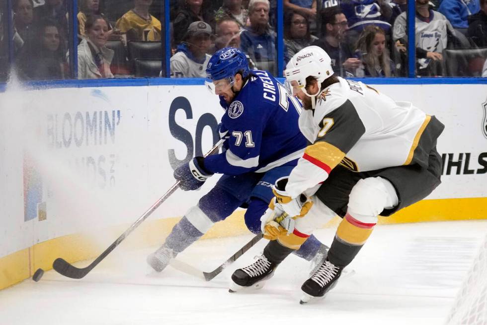 Tampa Bay Lightning center Anthony Cirelli (71) tries to work around Vegas Golden Knights defen ...