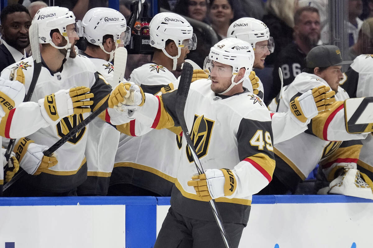 Vegas Golden Knights center Ivan Barbashev (49) celebrates with the bench after scoring against ...