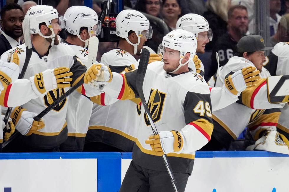 Vegas Golden Knights center Ivan Barbashev (49) celebrates with the bench after scoring against ...