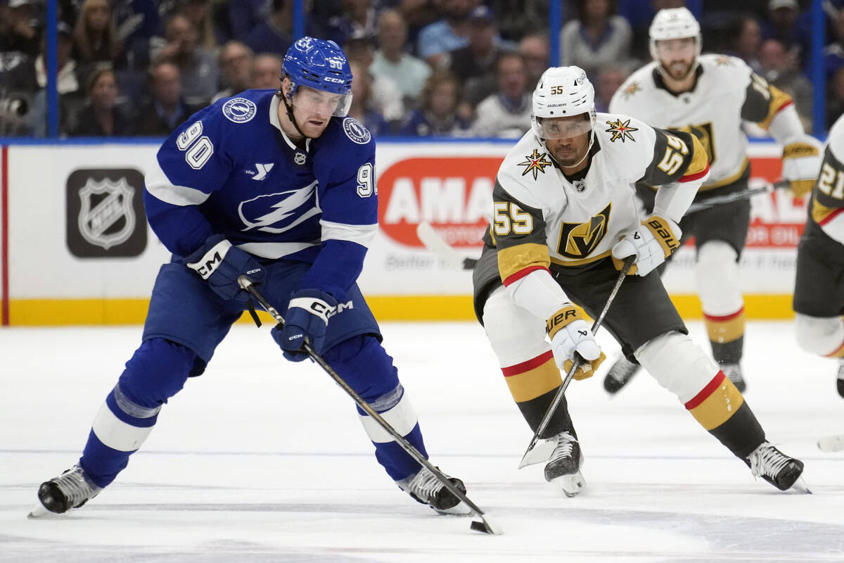 Tampa Bay Lightning defenseman Janis Moser (90) congrols the puck in front of Vegas Golden Knig ...