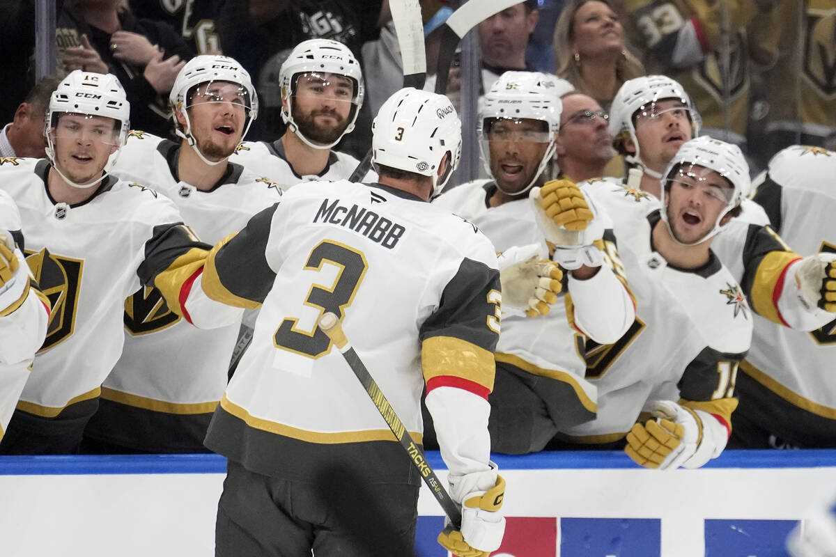 Vegas Golden Knights defenseman Brayden McNabb (3) celebrates with the bench after his goal aga ...