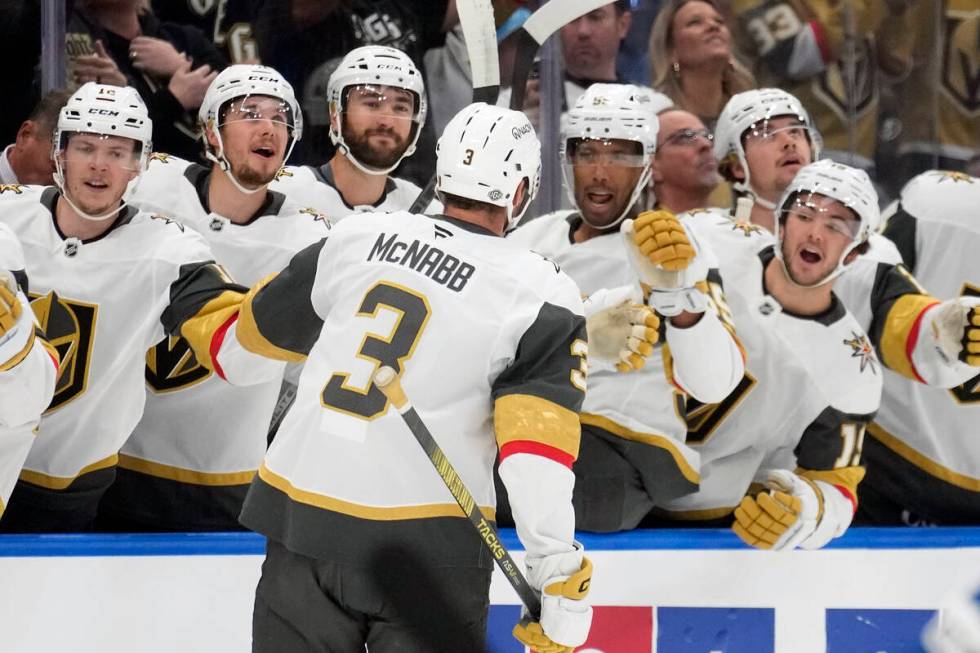 Vegas Golden Knights defenseman Brayden McNabb (3) celebrates with the bench after his goal aga ...