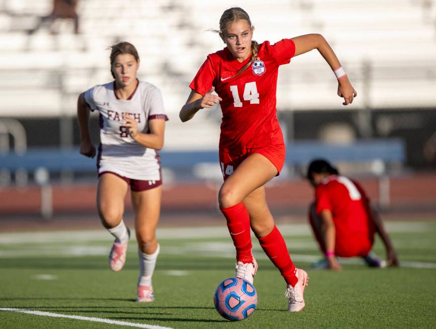 Coronado midfielder Allison Kleiner (14) moves the ball down the field during the high school s ...