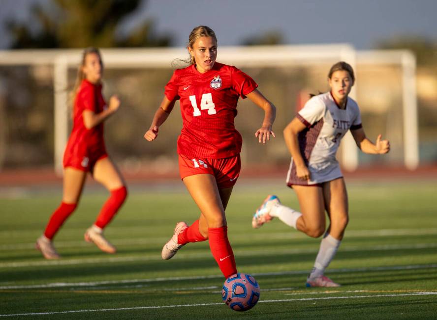 Coronado midfielder Allison Kleiner (14) moves the ball down the field during the high school s ...