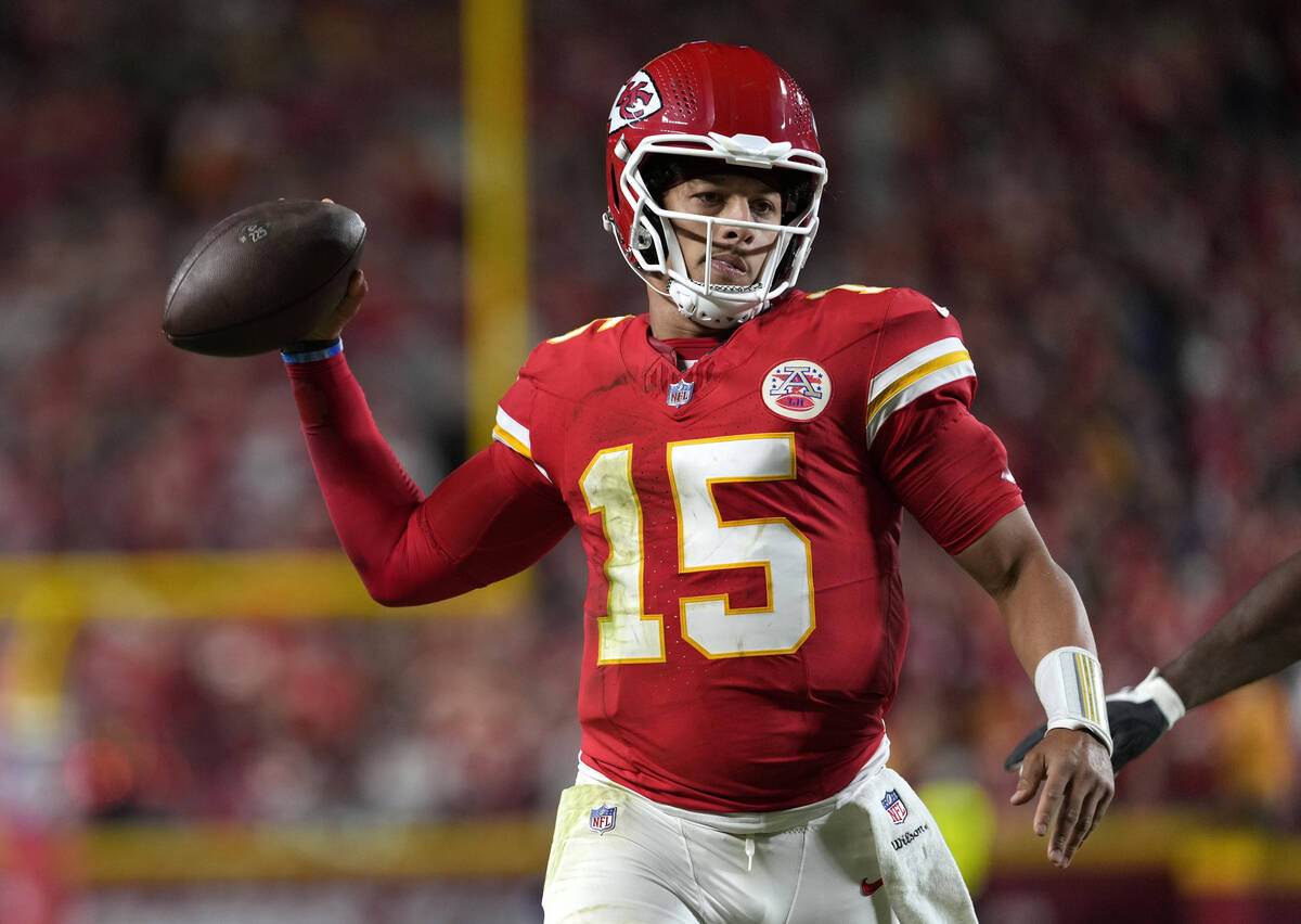 Kansas City Chiefs quarterback Patrick Mahomes looks to pass against the New Orleans Saints dur ...