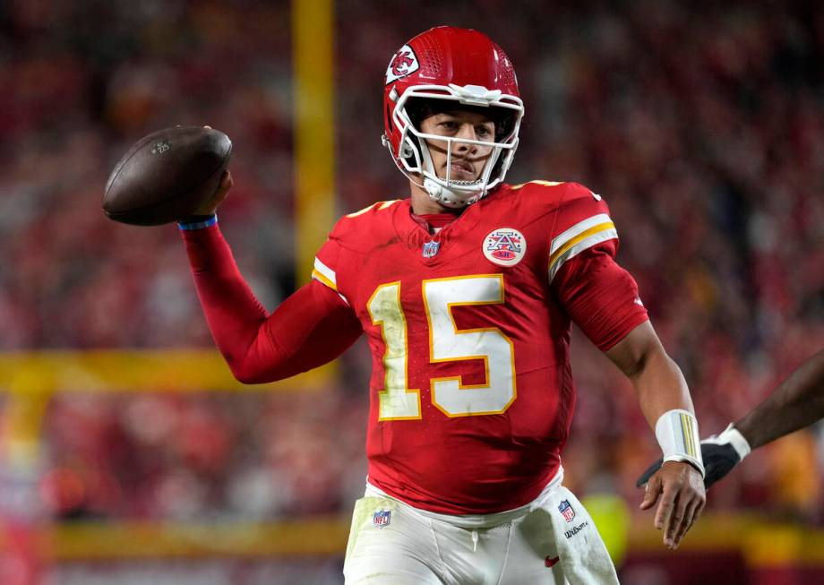 Kansas City Chiefs quarterback Patrick Mahomes looks to pass against the New Orleans Saints dur ...