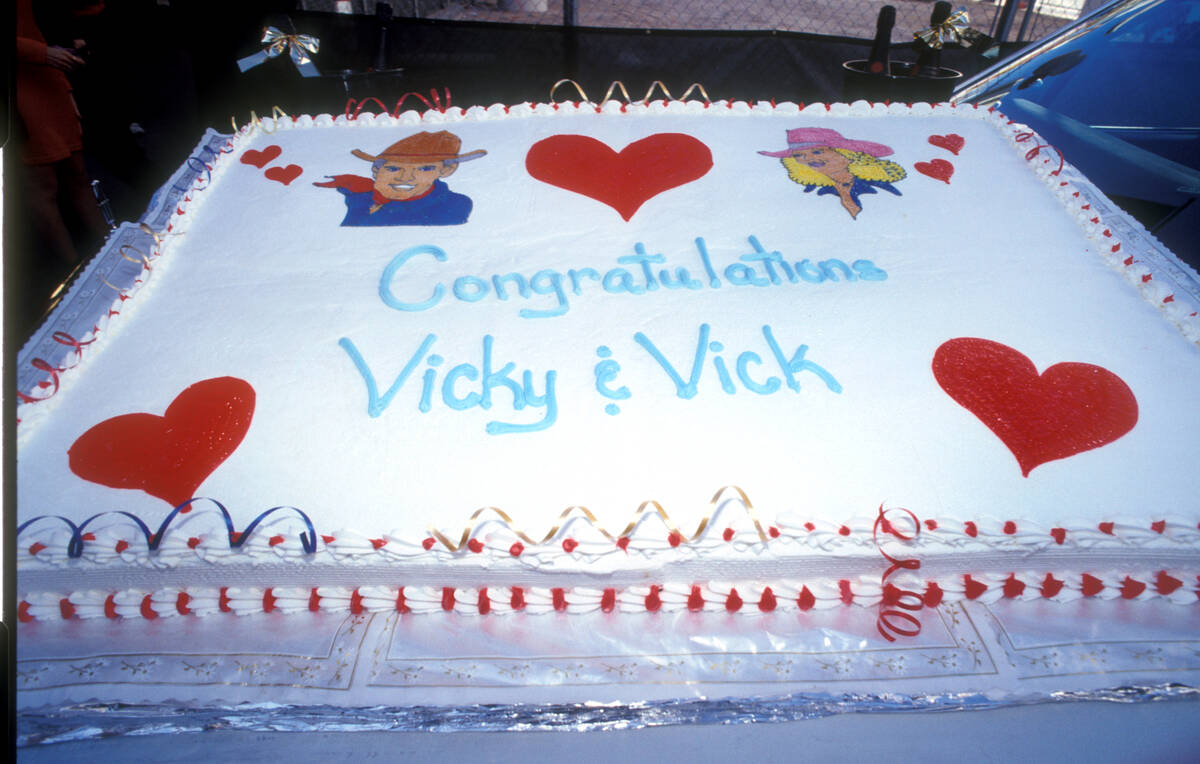 A wedding cake is seen during the “wedding” of the Vegas Vic & Vegas Vickie ...