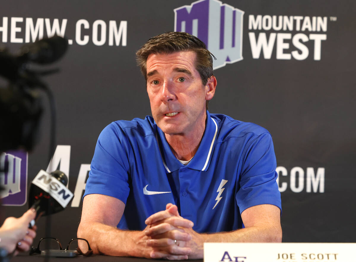 Joe Scott, head coach at Air Force, speaks during the Mountain West Conference men's basketball ...