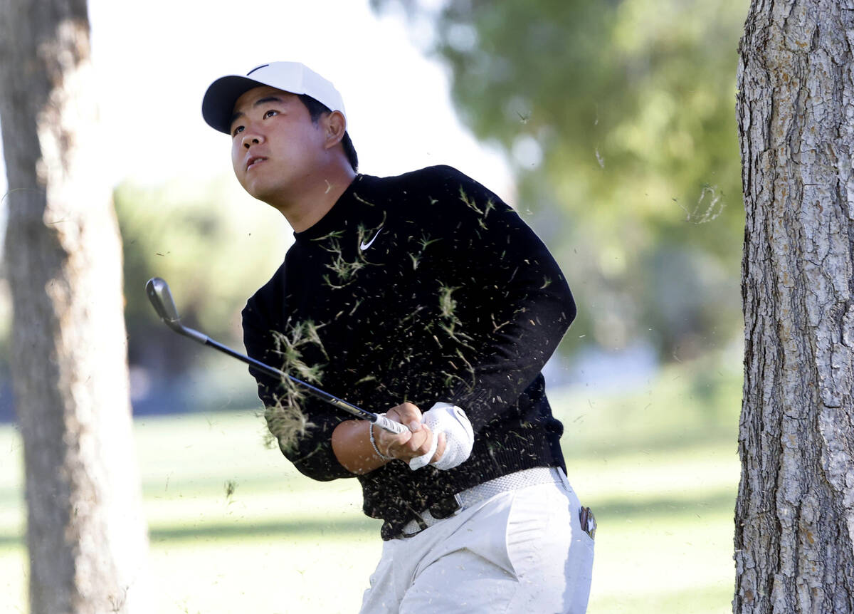 Tom Kim watches an approach shot from the 9th fairway during the second round of the Shriners C ...