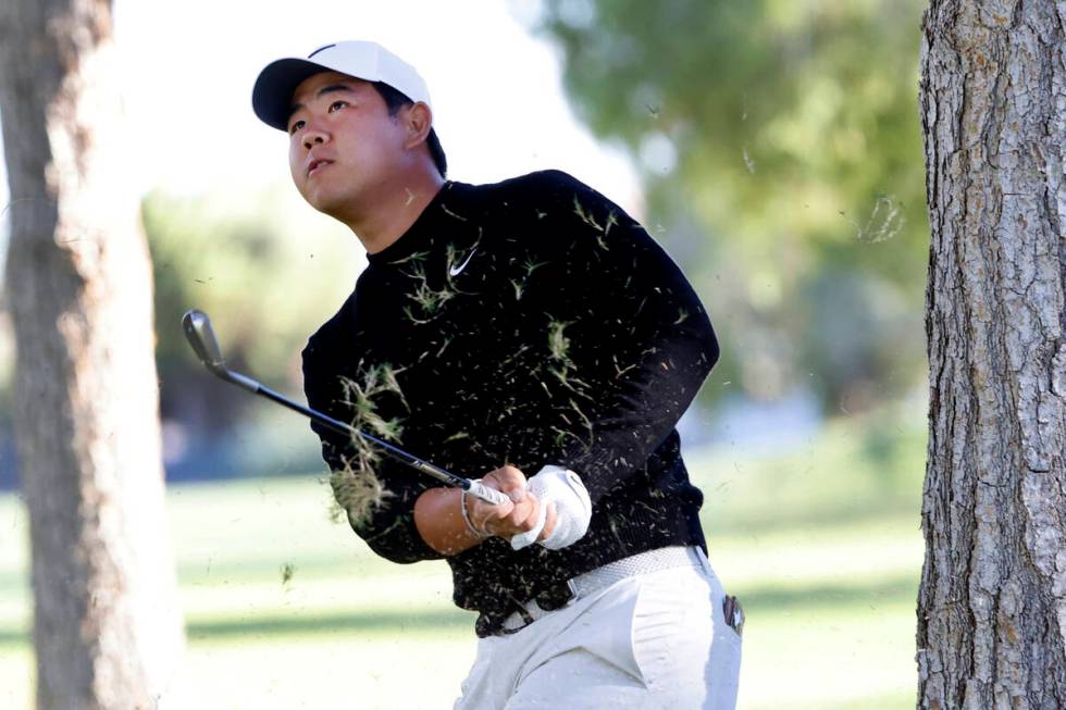 Tom Kim watches an approach shot from the 9th fairway during the second round of the Shriners C ...