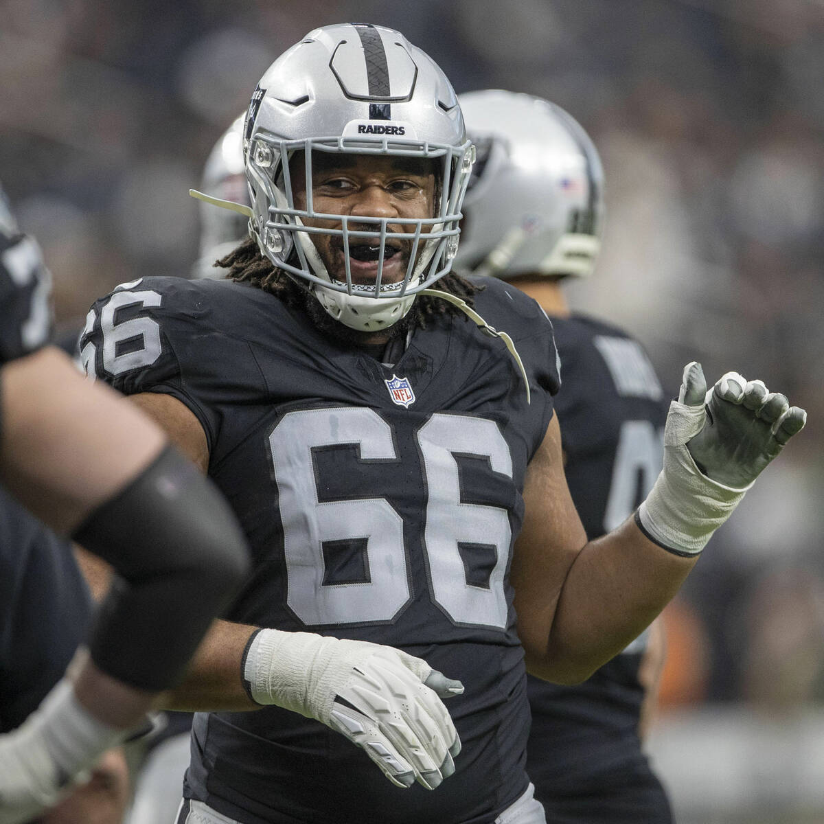 Raiders guard Dylan Parham (66) smiles during warm-ups before of an NFL game against the Denver ...