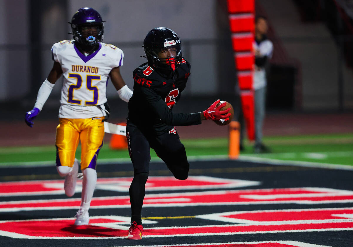 Las Vegas wide receiver Mychael Walker (6) carries the ball into the end zone for a touchdown d ...