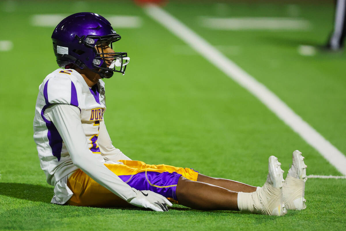 Durango wide receiver Michael Soto sits on the ground after failing to catch the ball during a ...