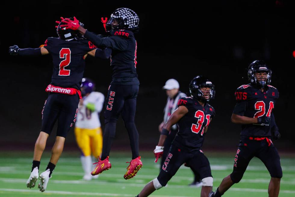 Las Vegas running back Mychael Walker (6) and cornerback Izaiah Cruz (2) celebrate during a hig ...