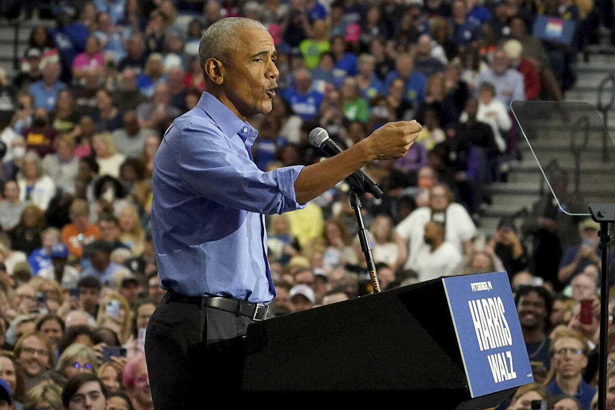 Former President Barack Obama speaks during a campaign rally supporting Democratic presidential ...